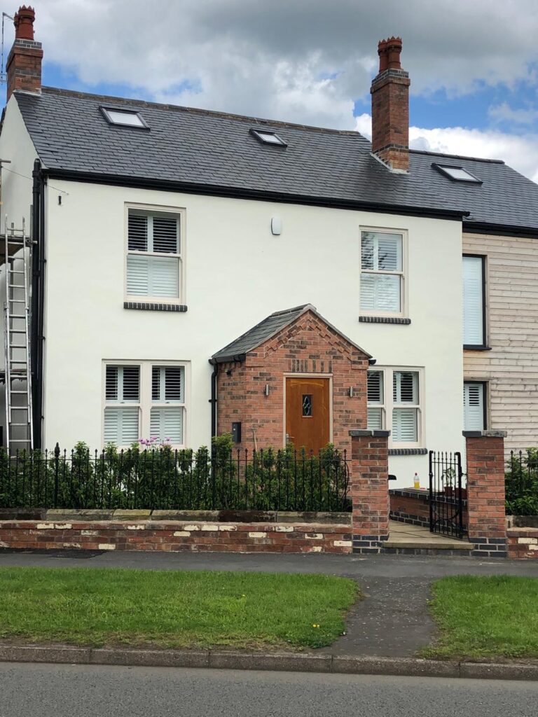 Exterior refurbishment photograph from Nicholson’s own portfolio; coating product and ECOPROCORK system are not verified.