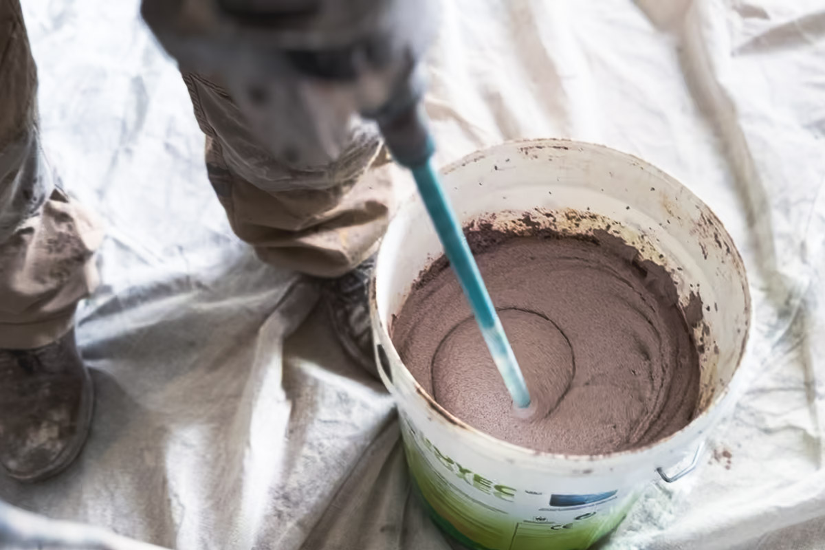 Cork material being mixed during practical applicator training