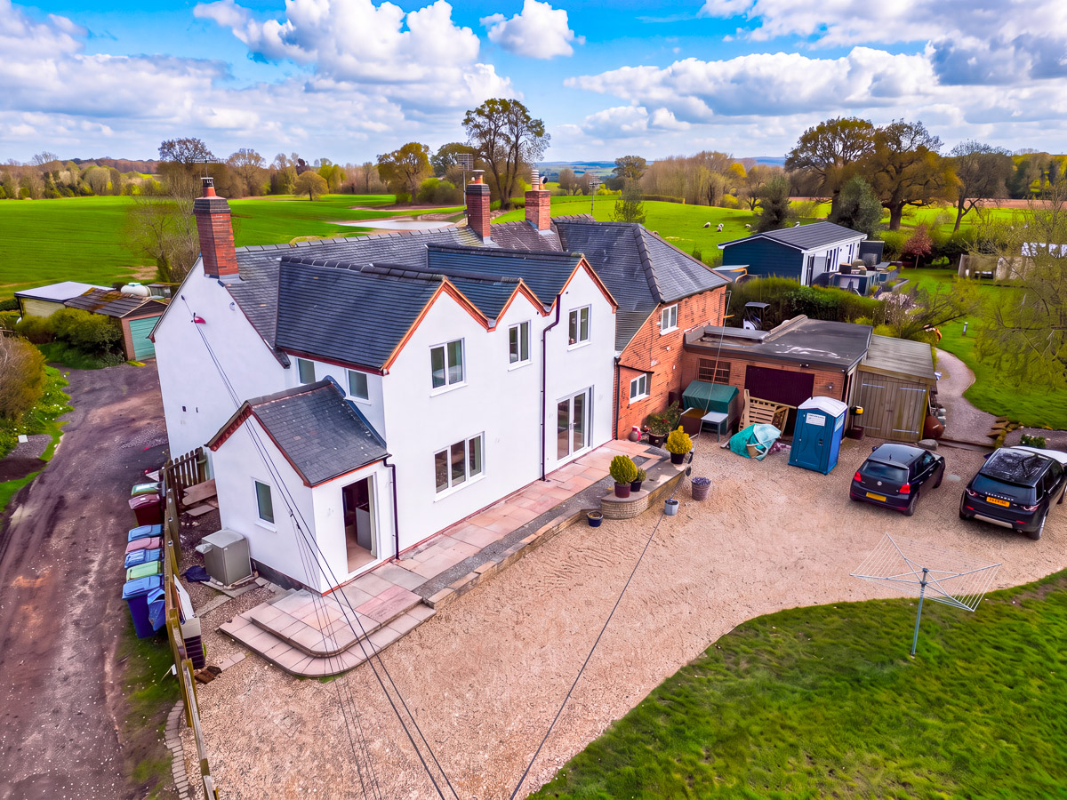 Completed white exterior of the Fradswell farmhouse