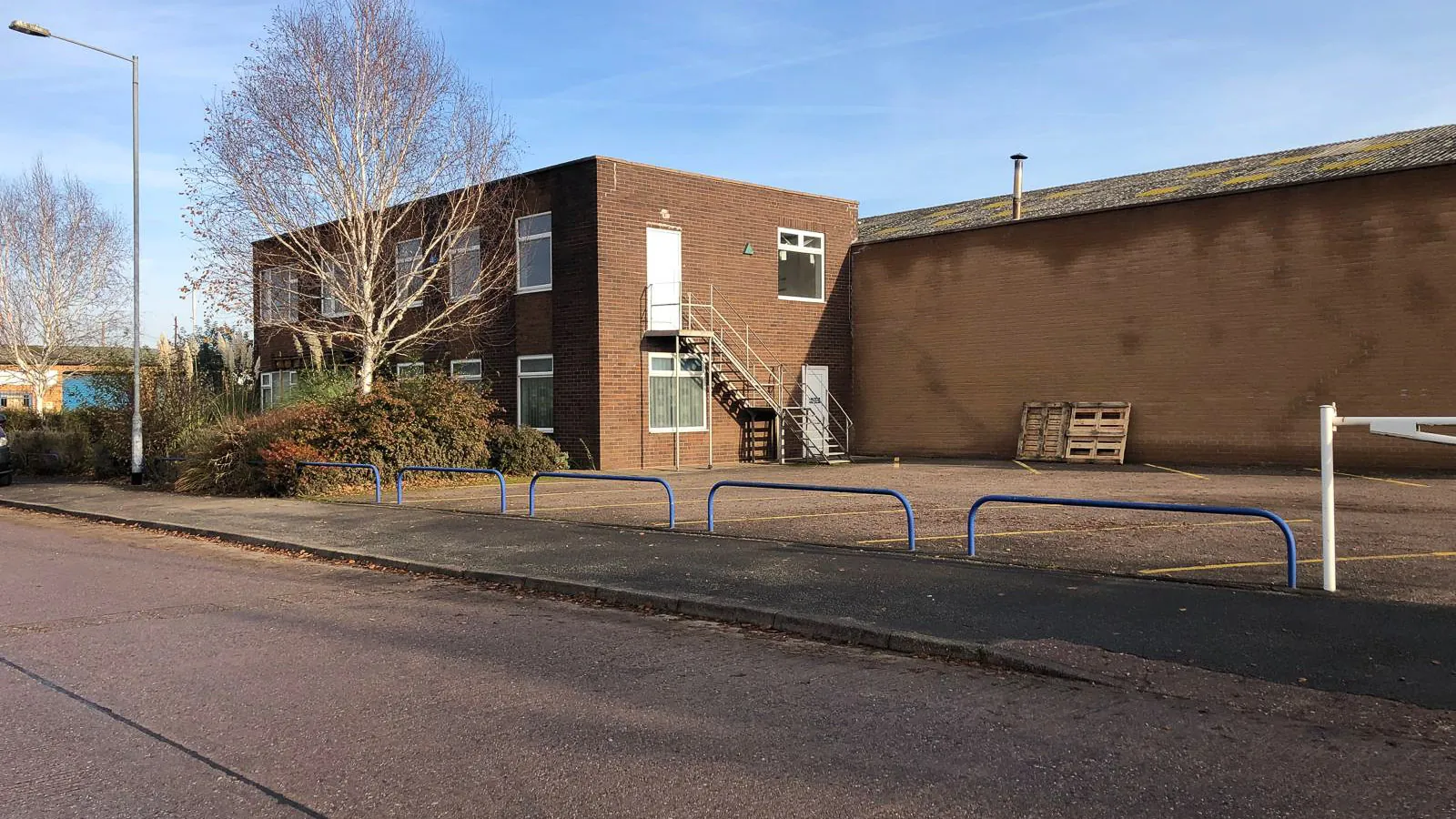Brown brick Birmingham factory frontage before refurbishment