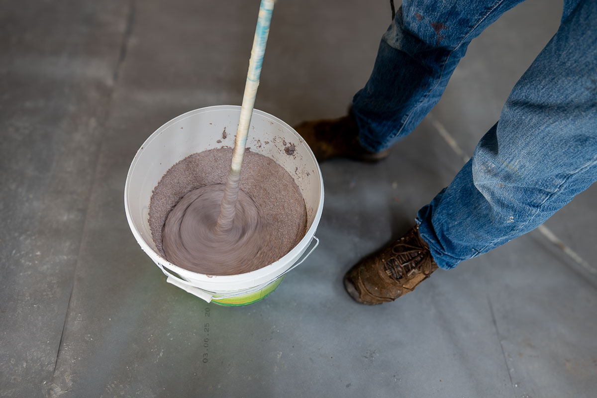 Mixed fine cork material in a bucket