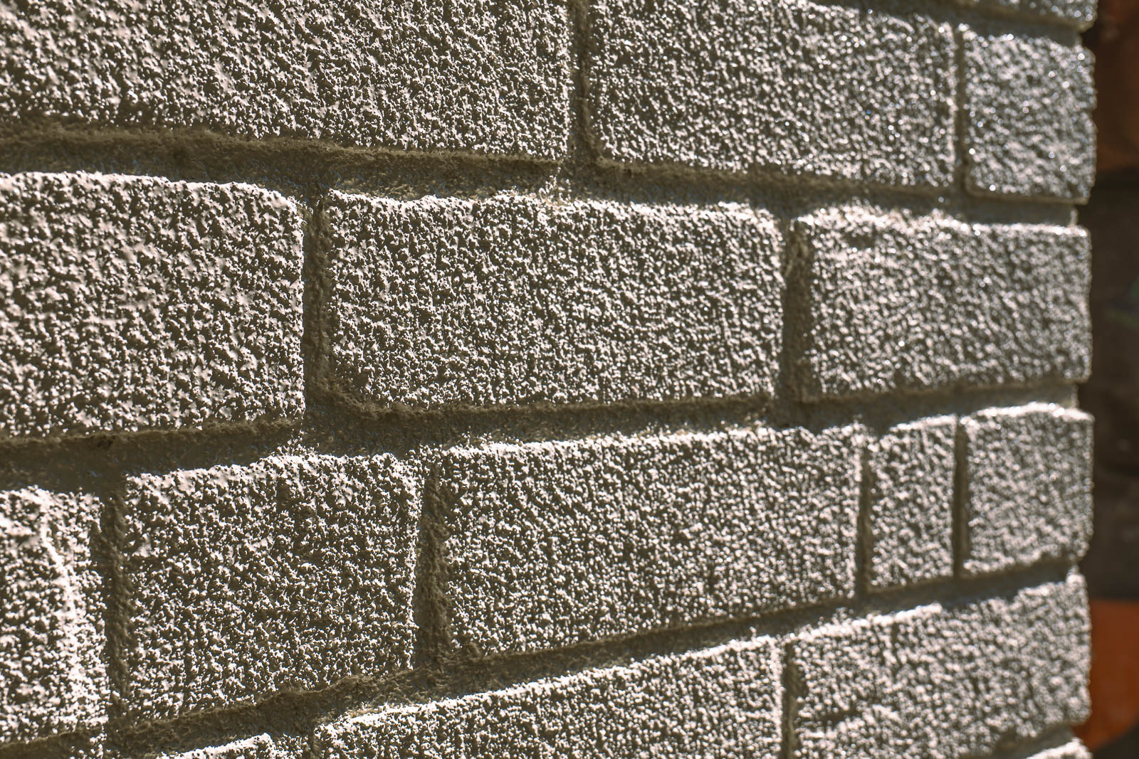 Cork texture following brick faces and mortar joints at Kings Norton
